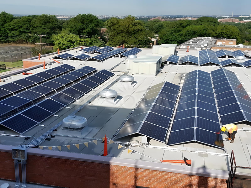 100KW Solar flat roof East-West ballasted system in India